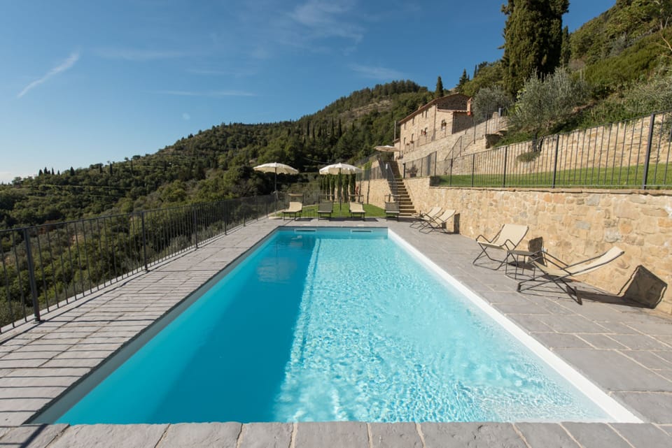 Outdoor pool, pool umbrellas, sun loungers