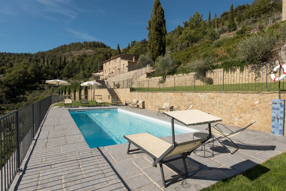Outdoor pool, pool umbrellas, sun loungers