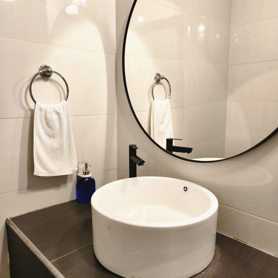 Shower, free toiletries, hair dryer, slippers
