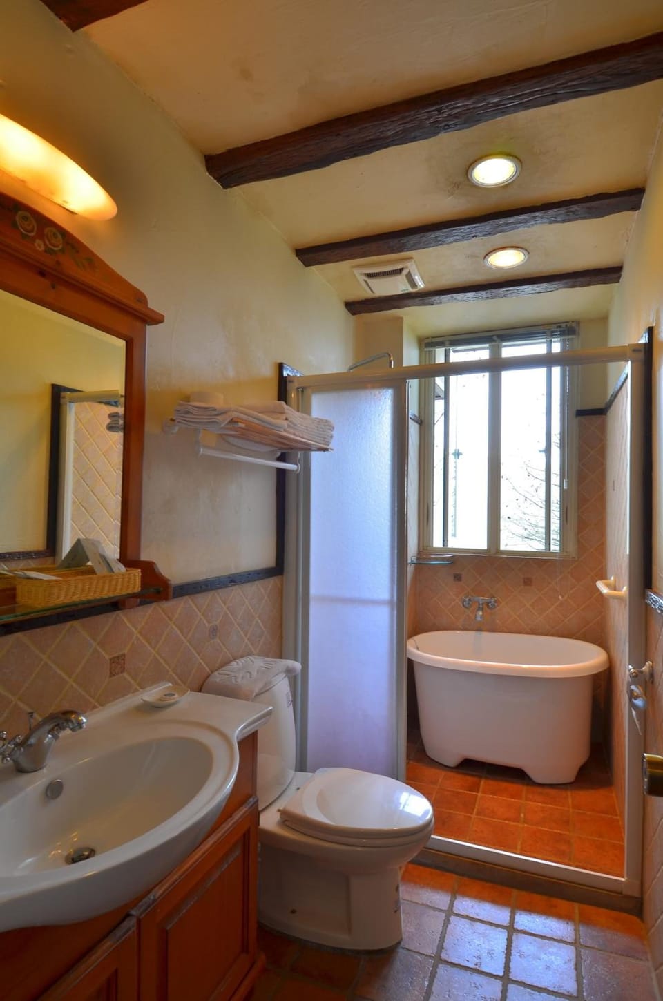 Shower, free toiletries, hair dryer, slippers