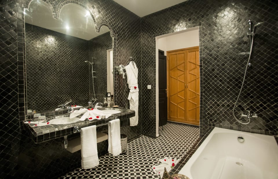 Senior Suite, Non Smoking | Bathroom | Separate tub and shower, free toiletries, hair dryer, bathrobes