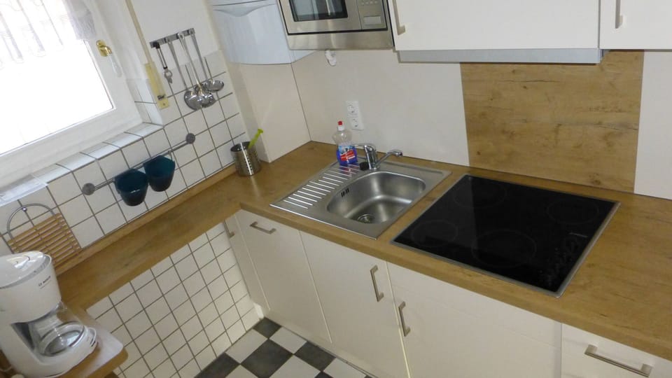 Apartment, 3 Bedrooms | Private kitchen | Fridge, microwave, stovetop, dishwasher