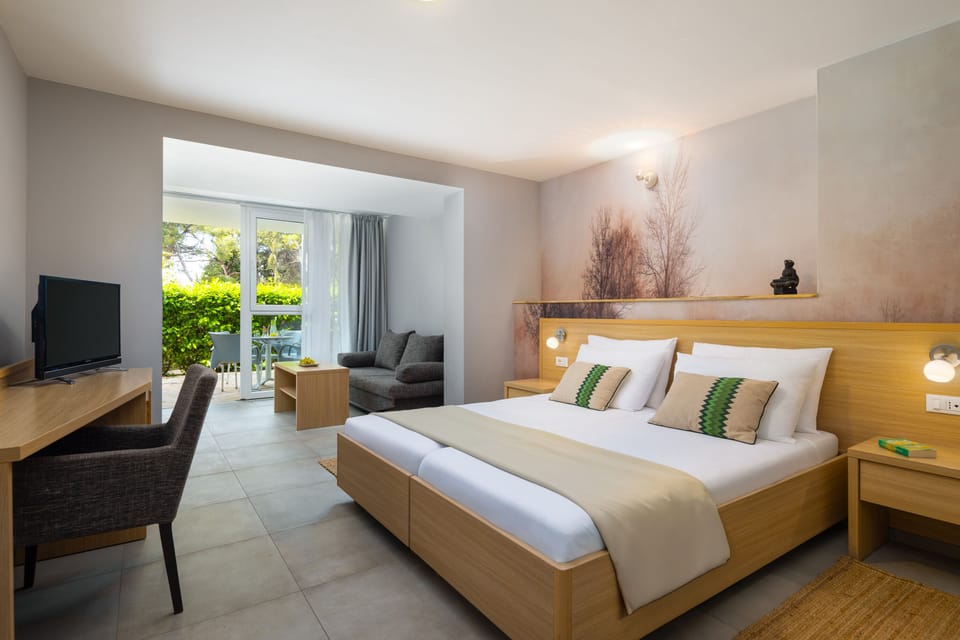 Superior Garden Room with Terrace | Minibar, in-room safe, desk, free WiFi