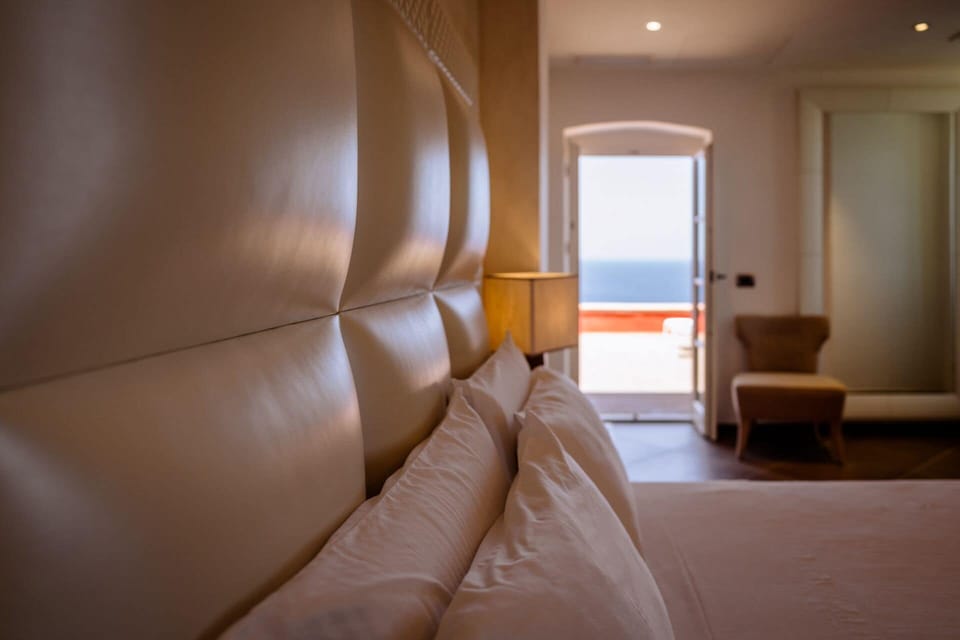 Luxury Suite, 1 Queen Bed, Terrace, Sea View | Minibar, in-room safe, desk, soundproofing