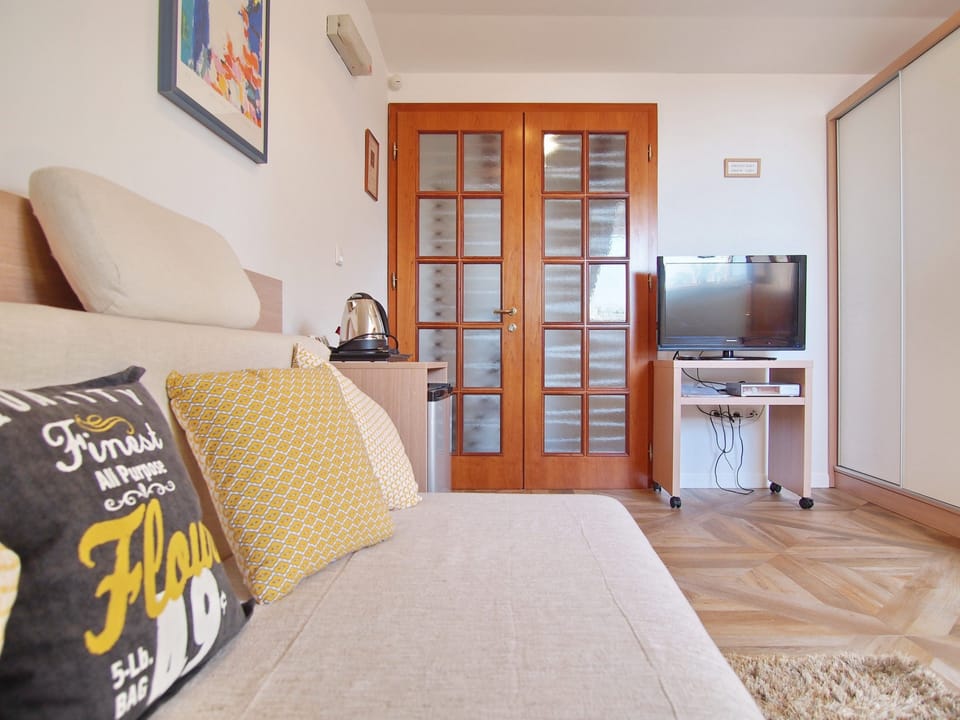 Suite, 2 Bedrooms, Sea View | Living area | Flat-screen TV