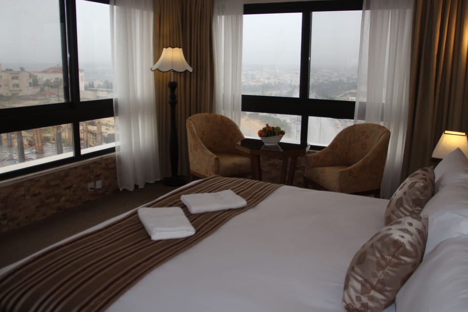 Premium Room | In-room safe, iron/ironing board (on request), cribs (free)