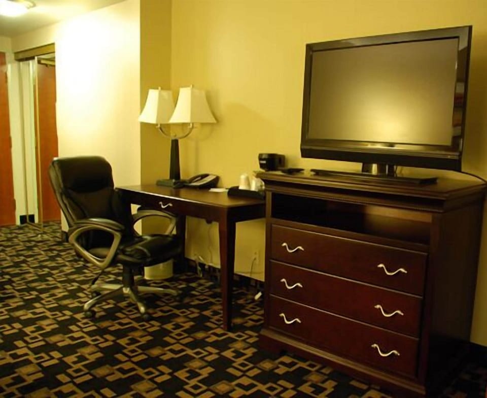 Family Suite, 1 Bedroom | Blackout drapes, iron/ironing board, free cribs/infant beds