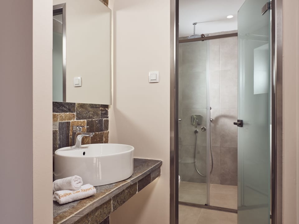 Shower, free toiletries, hair dryer, bathrobes