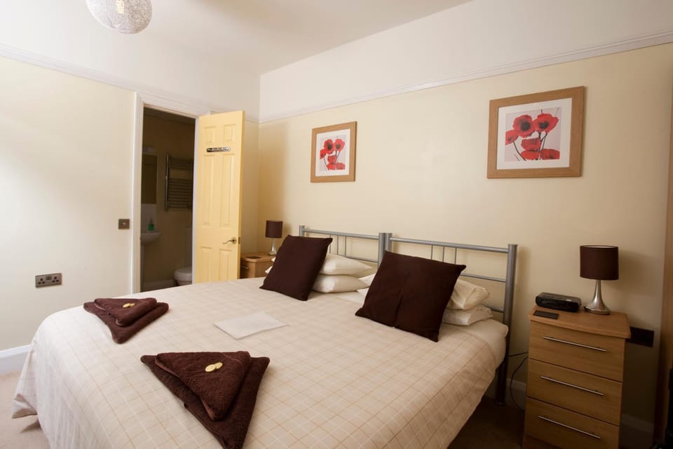 Premium bedding, minibar, blackout drapes, iron/ironing board