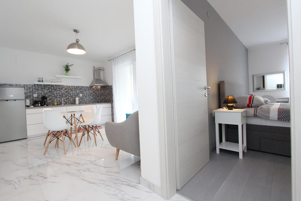 Apartment, 2 Bedrooms | Living area | TV