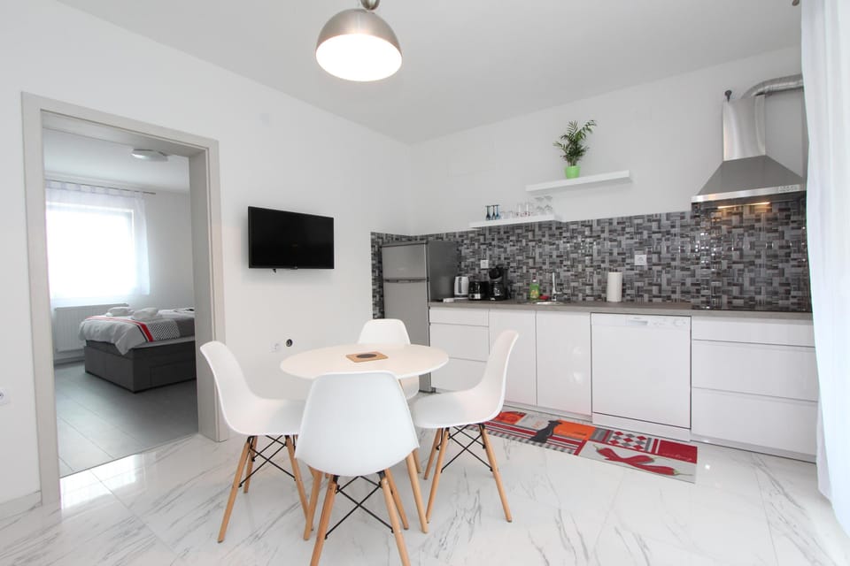 Apartment, 2 Bedrooms | Private kitchen | Fridge, microwave, stovetop, dishwasher