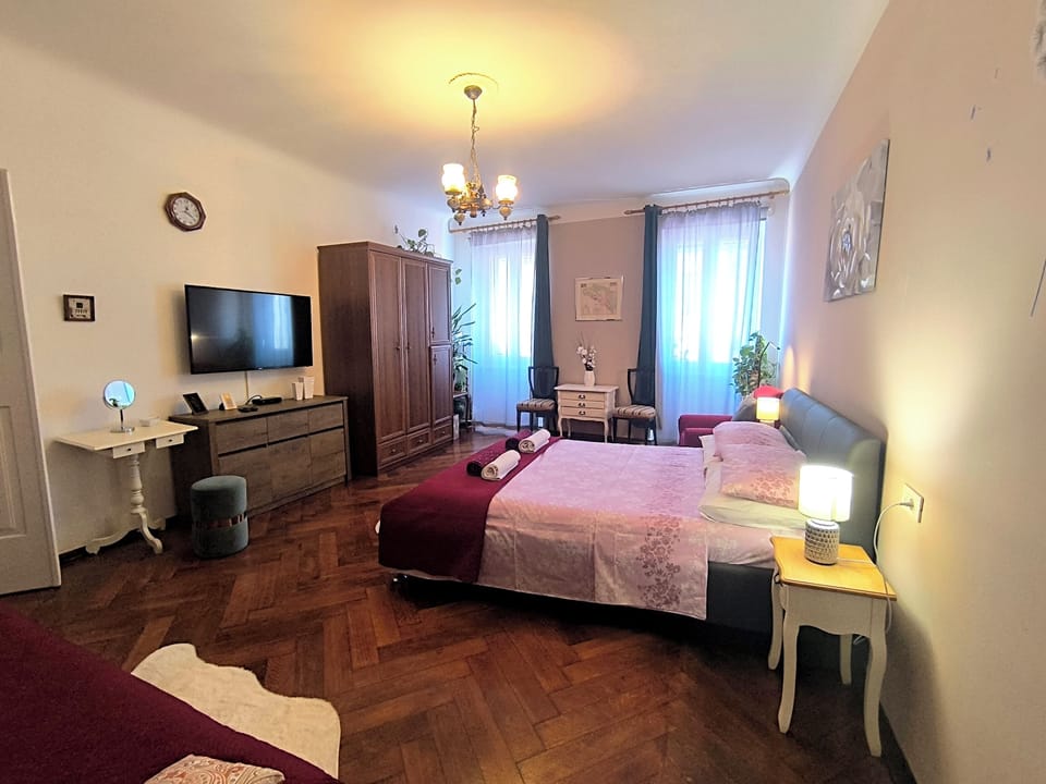 Apartment, 1 Bedroom | Desk, iron/ironing board, free WiFi, bed sheets