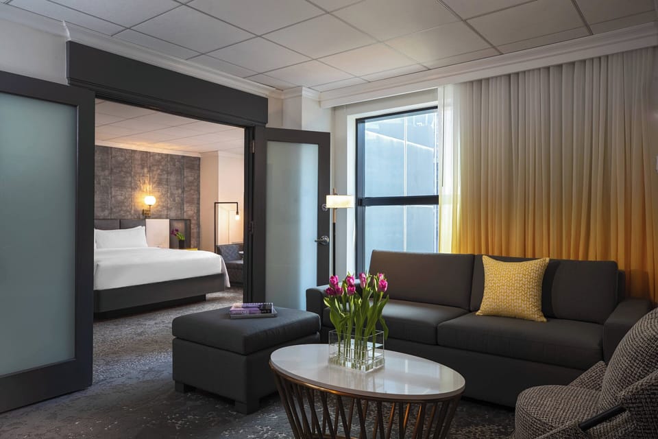 Executive Suite, 1 Bedroom, City View | Living area | 55-inch flat-screen TV with satellite channels, TV, pay movies