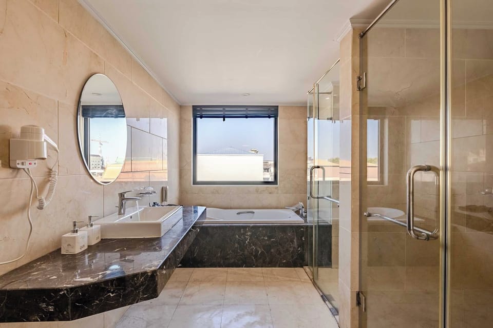 Superior Double Room | Bathroom | Shower, hair dryer, bathrobes, towels