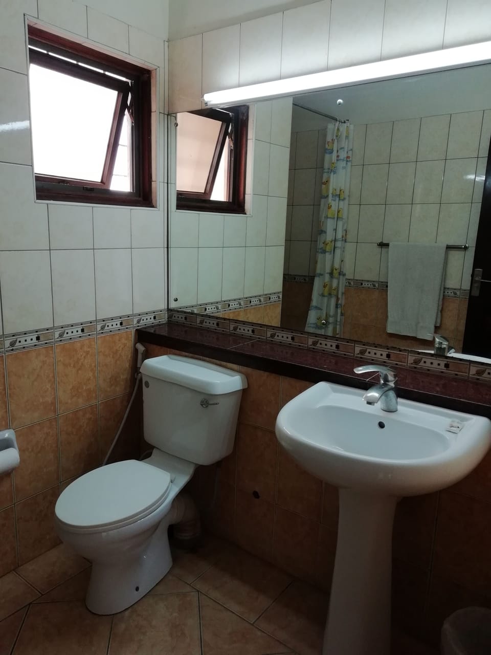 Twin Room, Private Bathroom | Bathroom | Shower, hair dryer, slippers, towels