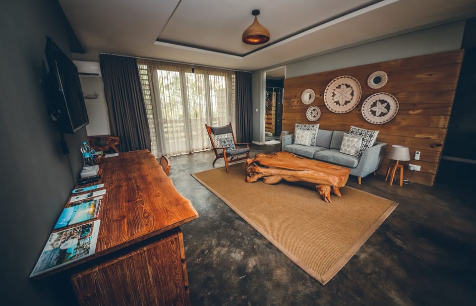 Junior Chalet, Ocean View | Living room | 32-inch LCD TV with satellite channels, TV