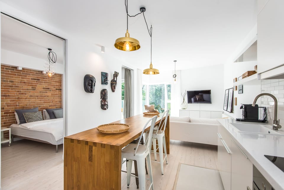 Design Apartment (Exotic) | Living area | Flat-screen TV
