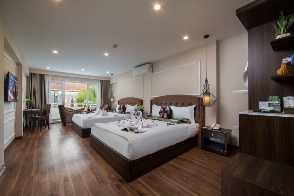 Family Room, Balcony | Minibar, in-room safe, desk, blackout drapes