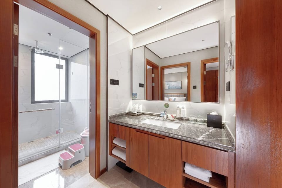 Family Suite, 2 Bedrooms (Kids Theme) | Bathroom | Shower, free toiletries, hair dryer, bathrobes