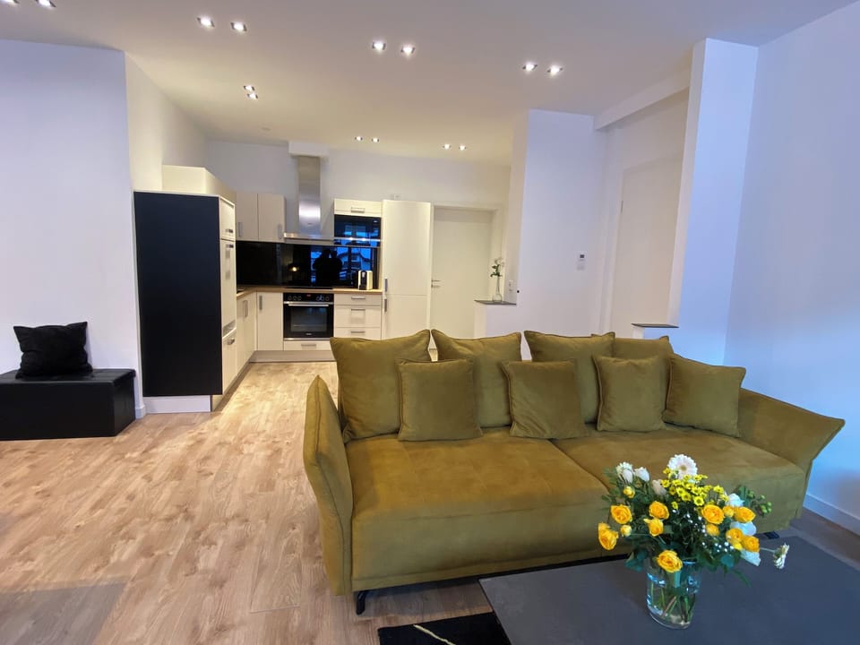 Premium Apartment, 2 Bedrooms | Living area | Flat-screen TV, heated floors