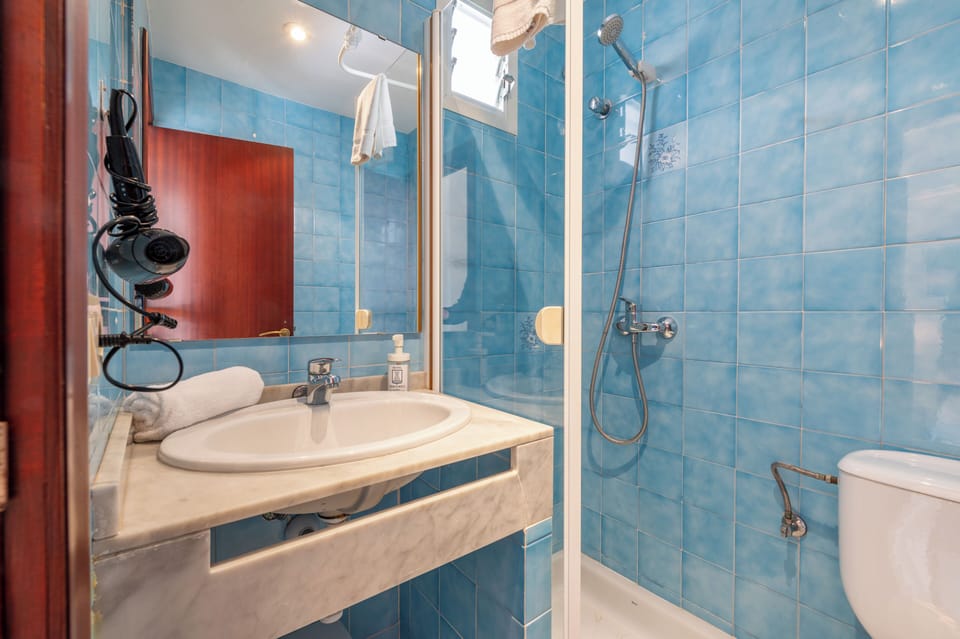 Single Room, Terrace (Street View) | Bathroom | Shower, hair dryer, towels, toilet paper