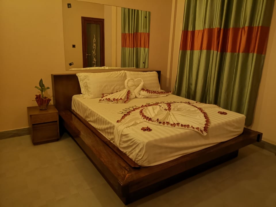 Blackout drapes, iron/ironing board, rollaway beds, free WiFi