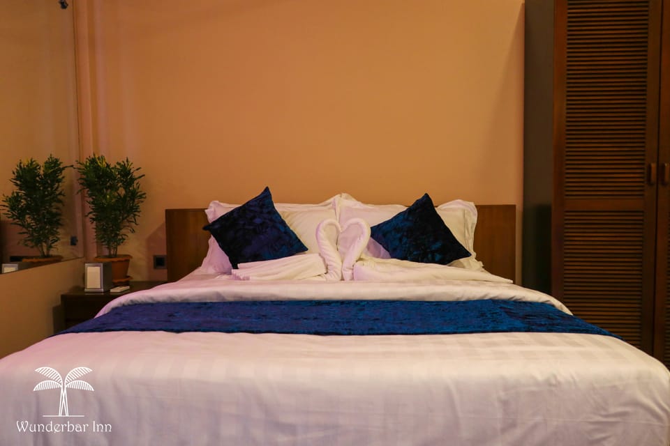Blackout drapes, iron/ironing board, rollaway beds, free WiFi