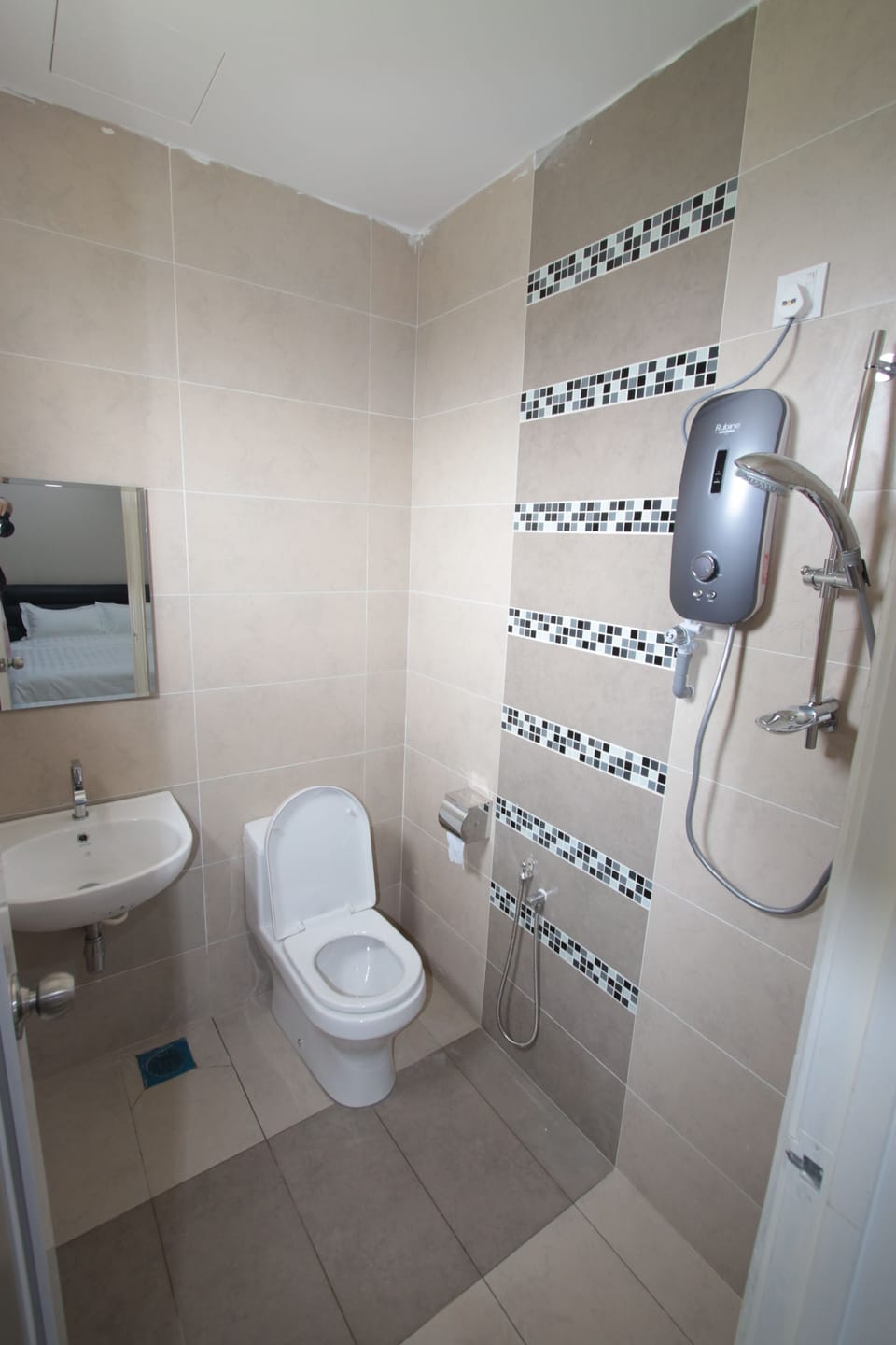 Shower, free toiletries, hair dryer, slippers