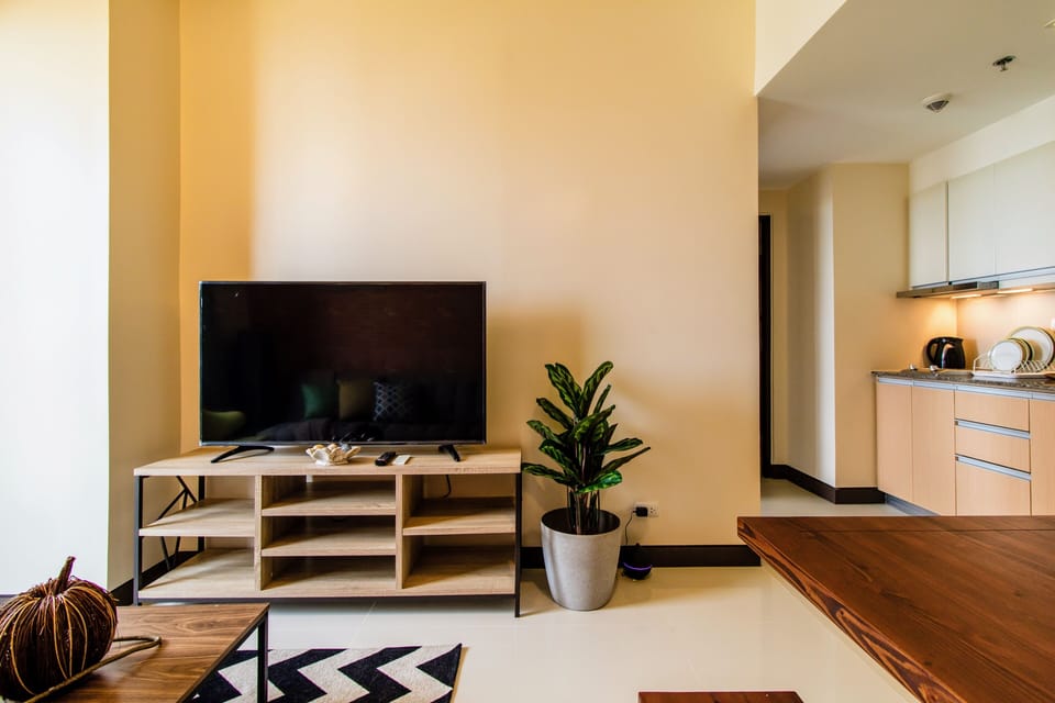 Exclusive Condo, 1 Queen Bed with Sofa bed, Lake View | Living area | LED TV, Netflix