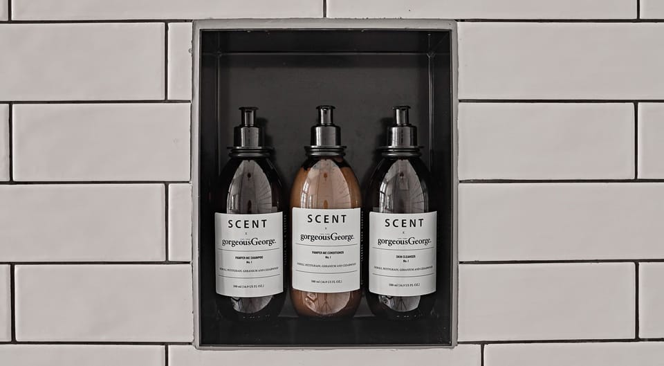 Shower, designer toiletries, hair dryer, bathrobes