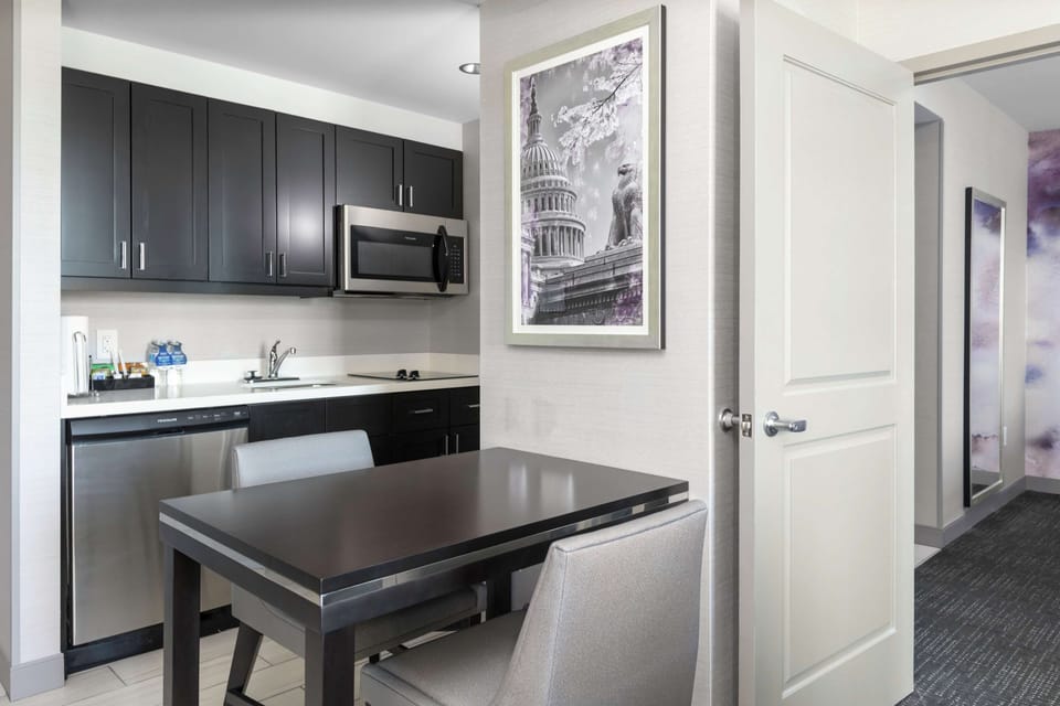 Full-size fridge, microwave, stovetop, dishwasher