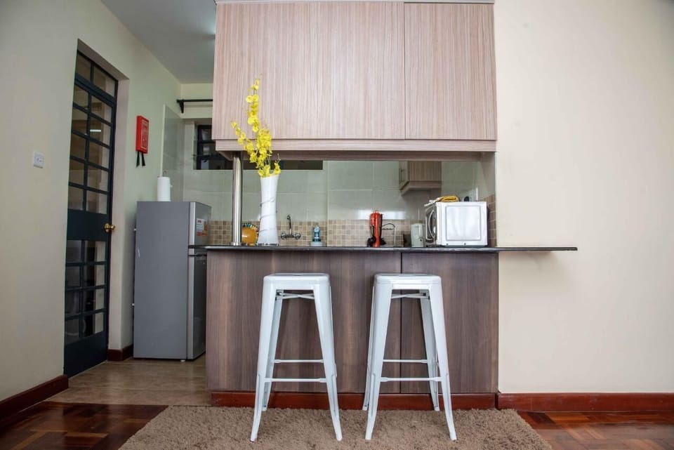 Apartment, 1 Double Bed, Non Smoking | Private kitchen | Full-size fridge, microwave, oven, stovetop