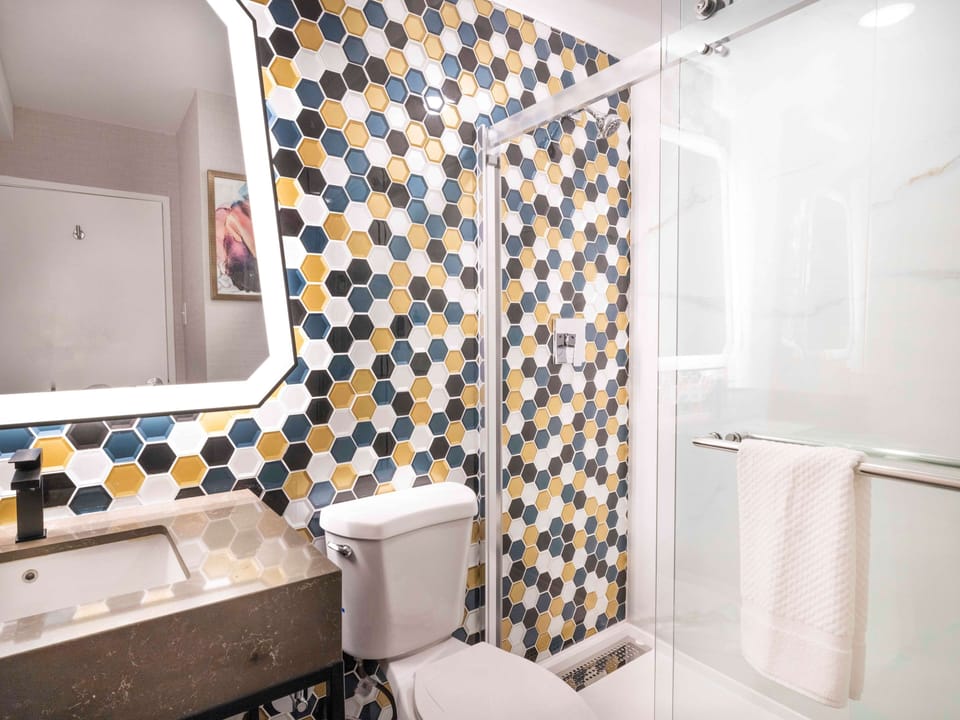 Shower, free toiletries, hair dryer, towels