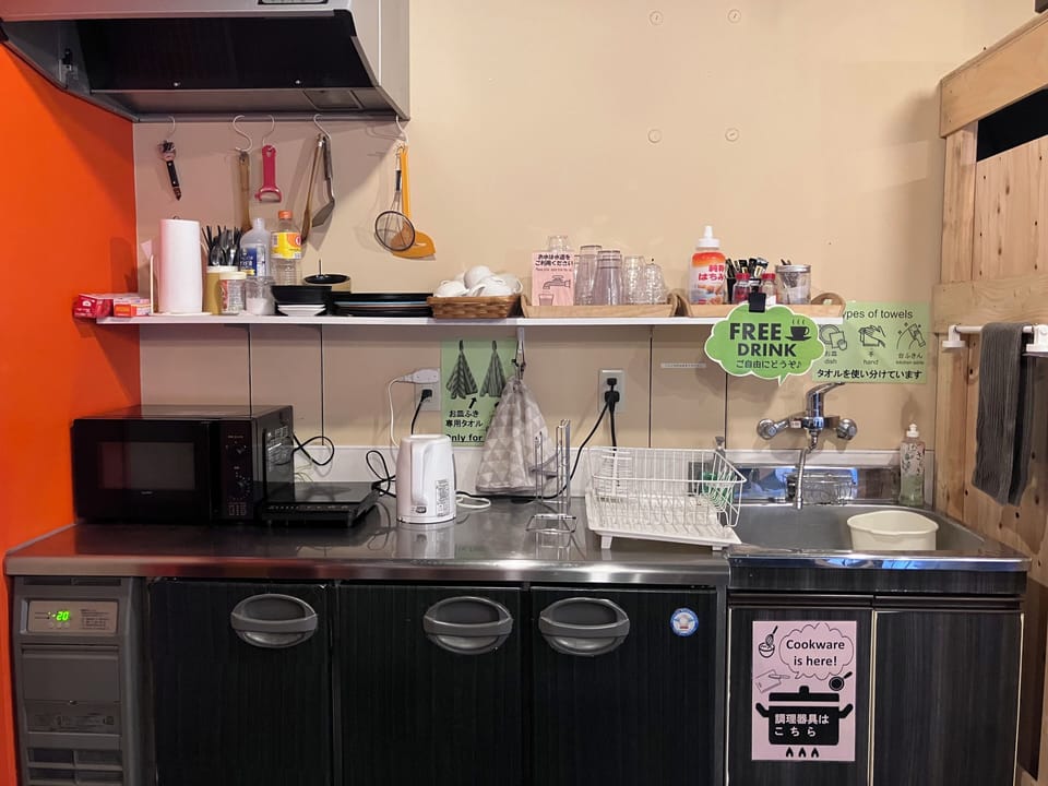 Mini-fridge, microwave, stovetop, cookware/dishes/utensils