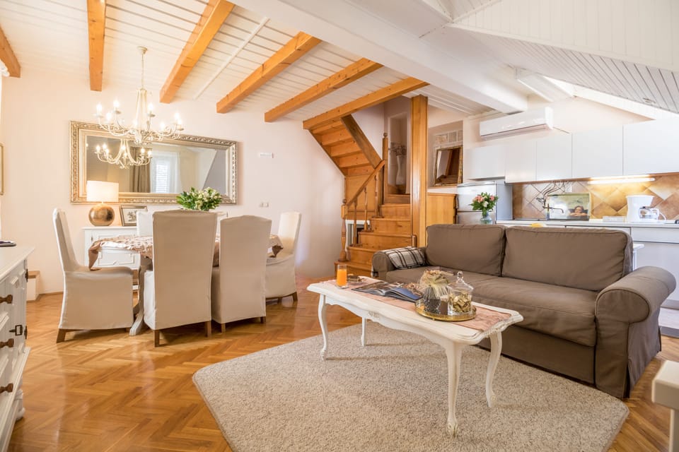 Superior Apartment, 2 Bedrooms | Living area | 105-cm flat-screen TV with satellite channels, TV, DVD player