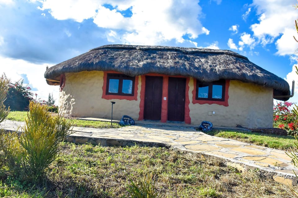 Deluxe Cottage, Non Smoking, Valley View | Desk, individually decorated, bed sheets