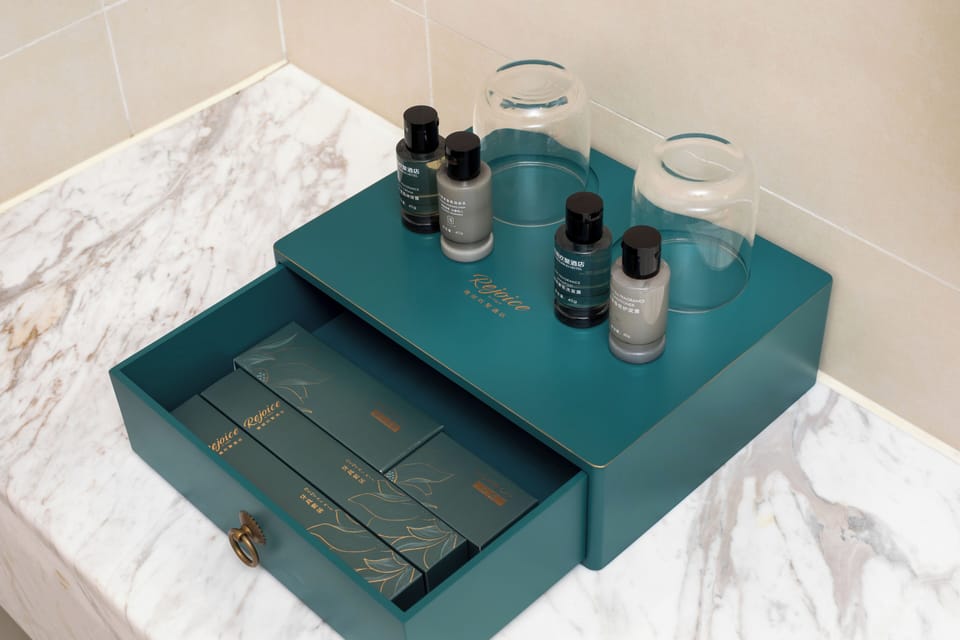 Shower, free toiletries, hair dryer, slippers