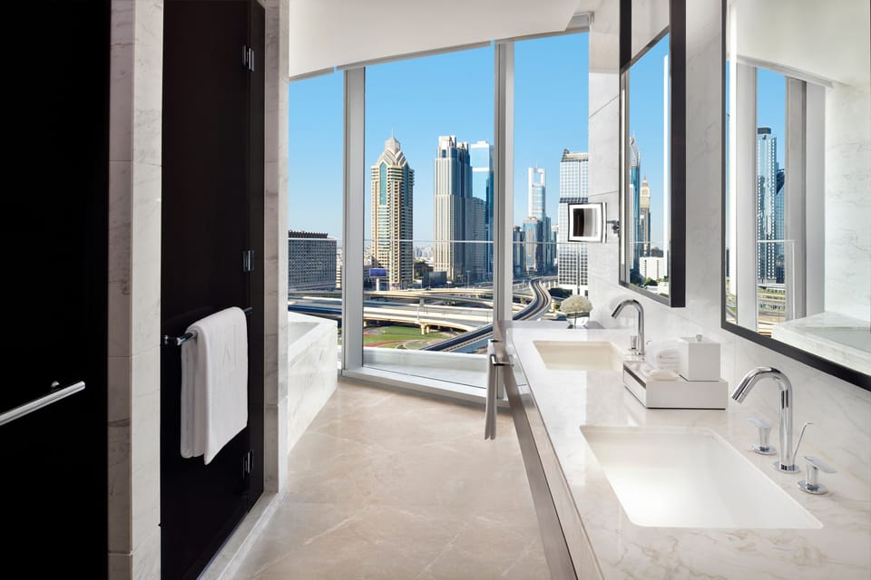 Junior Suite - Exclusive Access to Level 54 Infinity Pool & Club Lounge | Bathroom | Combined shower/tub, free toiletries, hair dryer, bathrobes