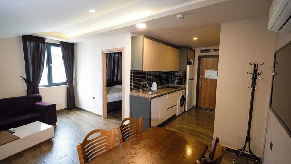 Deluxe Apartment | Premium bedding, blackout drapes, soundproofing, iron/ironing board