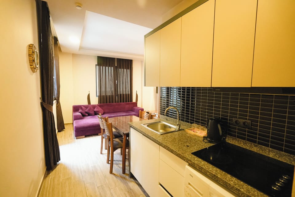 Deluxe Apartment, 1 Bedroom, Garden Area | Premium bedding, blackout drapes, soundproofing, iron/ironing board