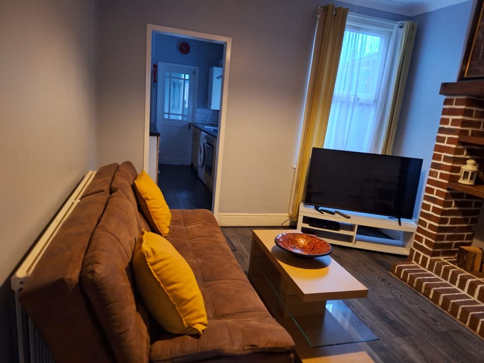 Economy House, Private Bathroom, Garden View (Contractors | Traders) | Living area | Flat-screen TV