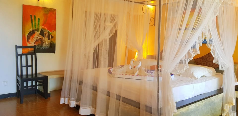 Deluxe Cabana | 10 bedrooms, minibar, in-room safe, individually decorated