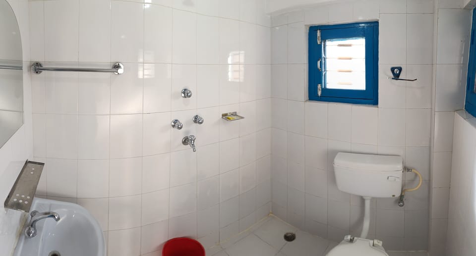 Shower, free toiletries, slippers, towels