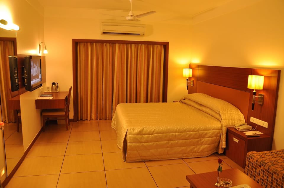 Deluxe Room, Non Smoking, City View | Premium bedding, in-room safe, individually decorated