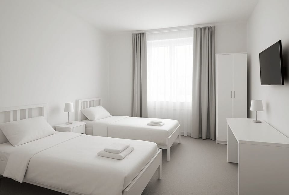 Apartment, 2 Bedrooms | Living room | Flat-screen TV, offices, computer monitors