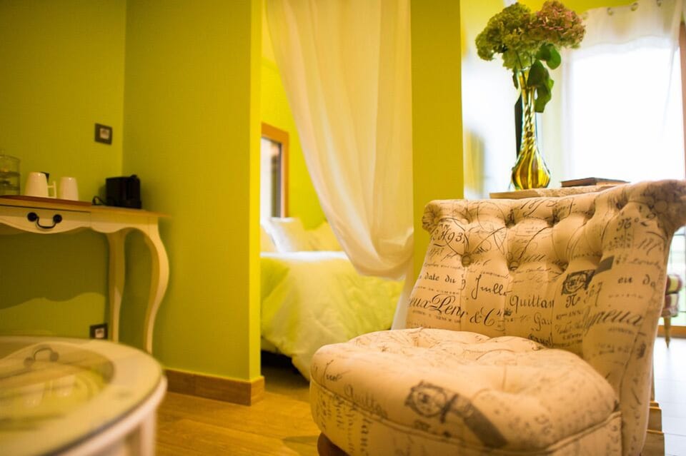 Suite (Alencon) | Living area | Flat-screen TV, heated floors