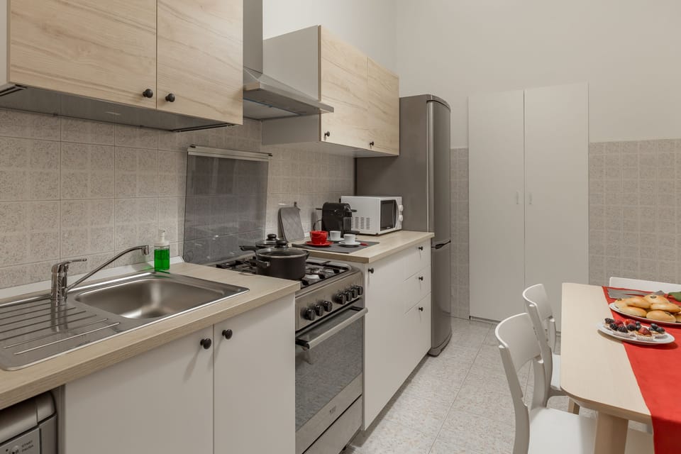 Apartment, 2 Bedrooms | Private kitchen | Full-size fridge, microwave, oven, stovetop