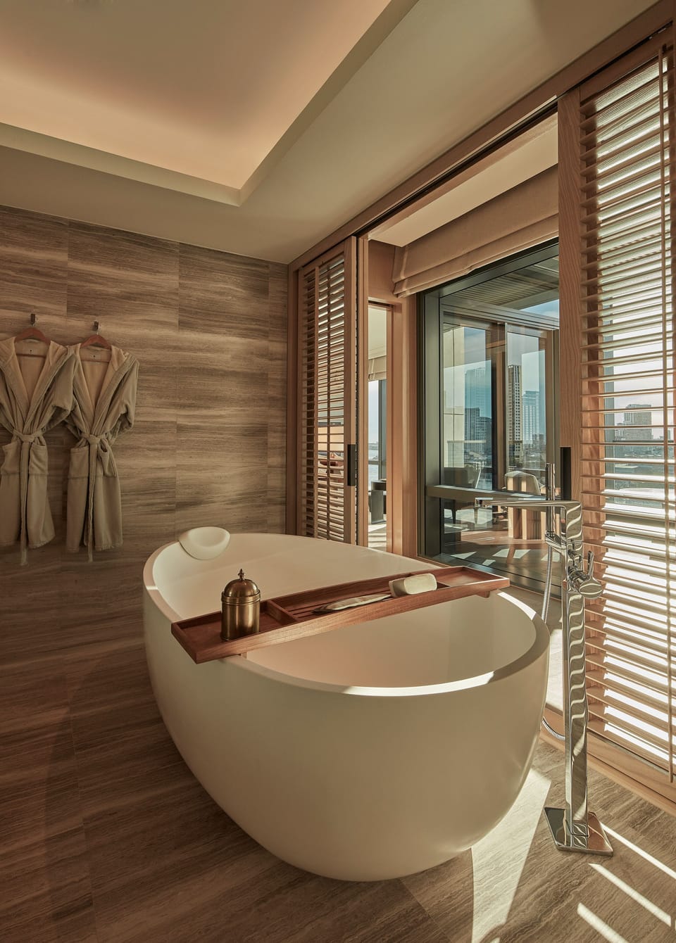 Separate tub and shower, rainfall showerhead, designer toiletries