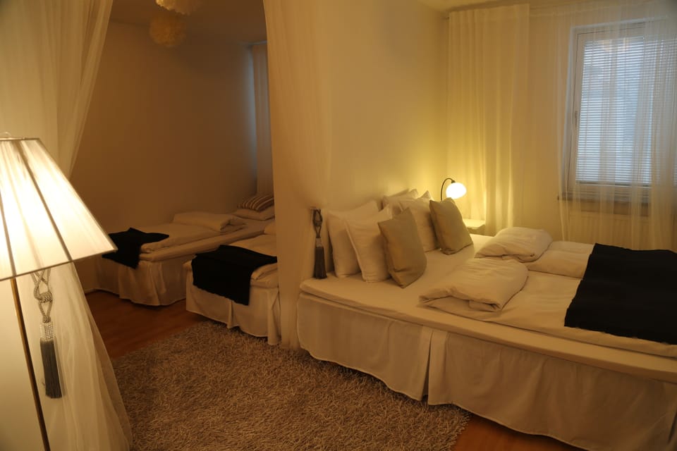 Quadruple Room | Desk, blackout drapes, WiFi (free), bed sheets