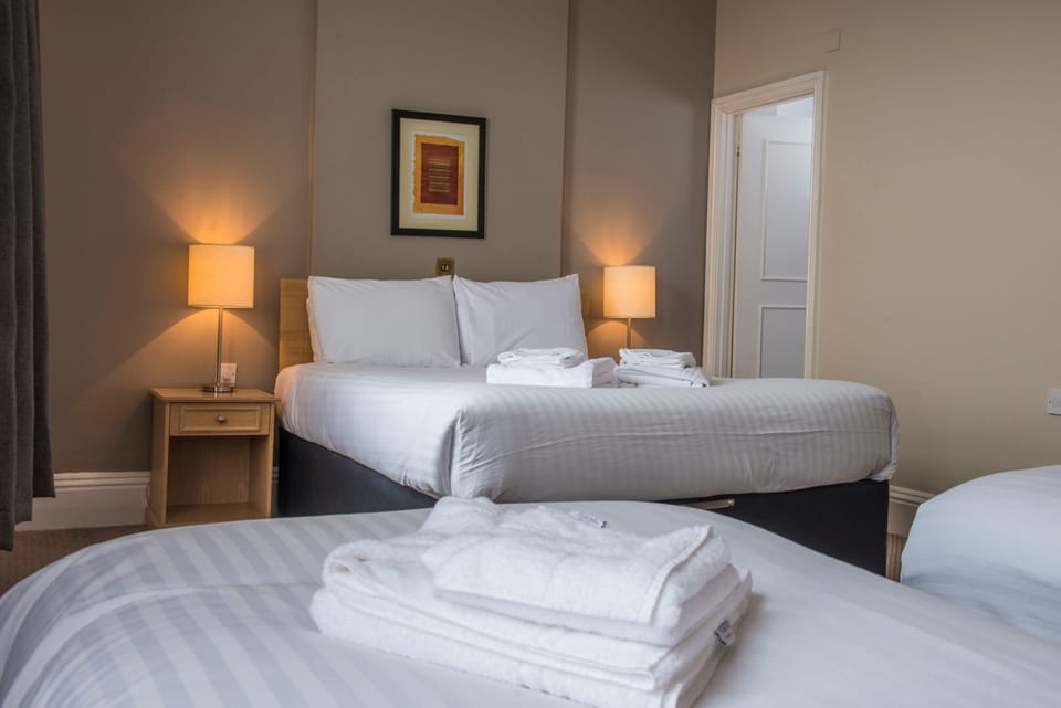 Family Room | Desk, iron/ironing board, free WiFi, bed sheets